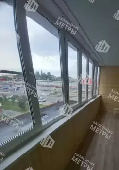 Отделка балкона с утеплением и остеклением Rehau